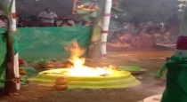 Devotees are engrossed in ecstasy at the sight of the Goddess in the yaga fire
