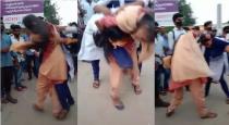 Andra Pradesh Visakhapatnam Girl Students fight for Boy Friend in Roadside Bus Stop  